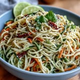 Refreshing soba noodle salad showcasing colorful veggies, perfect summer side dish.