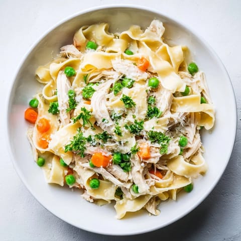 Spring Chicken Noodle Skillet topped with fresh parsley, a comforting family-friendly dinner ready to serve in a home kitchen.  