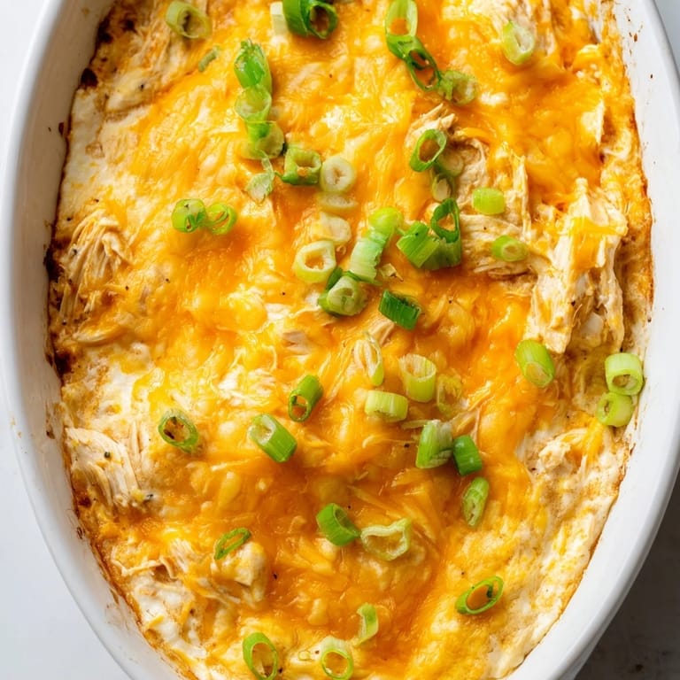 Delicious and spicy Buffalo Chicken Dip, perfect for game day, baked to golden perfection, ready to enjoy.